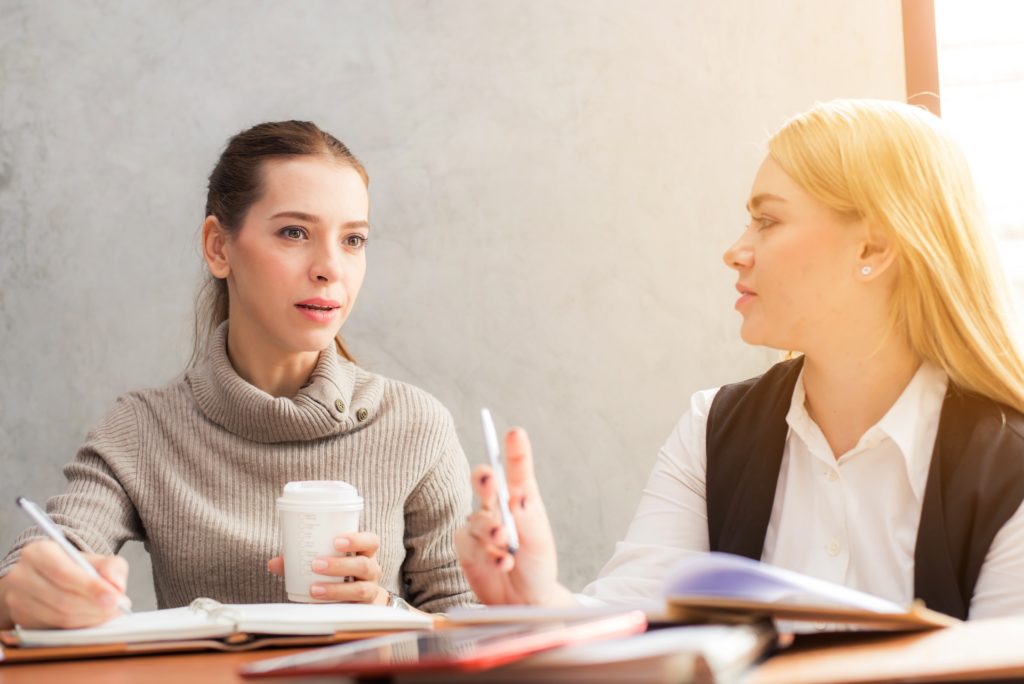 girls are discussing about topic